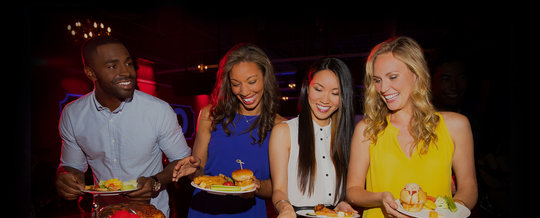 Coworkers enjoying buffet