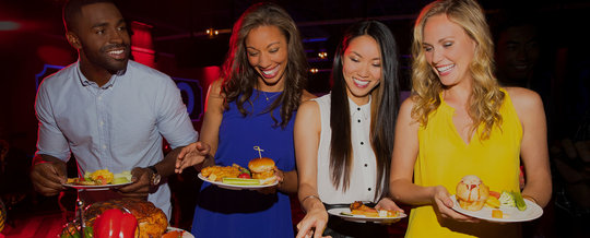 Coworkers enjoying buffet