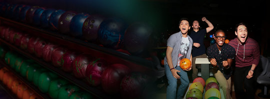 excited people with bowling balls in the background